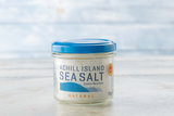 Jar of Achill Island Sea Salt on a blurred beach background