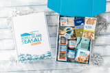 Gift box with Achill Island Sea Salt products on a wooden surface