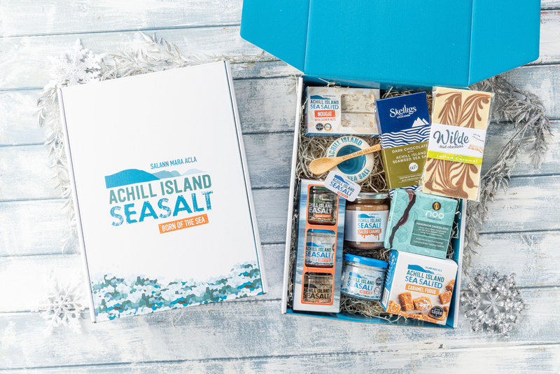 Gift box with Achill Island Sea Salt products on a wooden surface