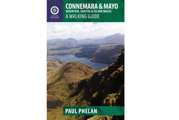 Walking guide book cover with mountain landscape and lake
