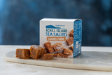 Box of Achill Island Sea Salted Caramel Fudge on a marble surface with a blue background